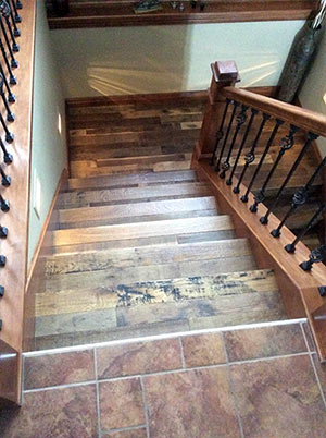 Organic Masala solid hardwood flooring installed on stairs.