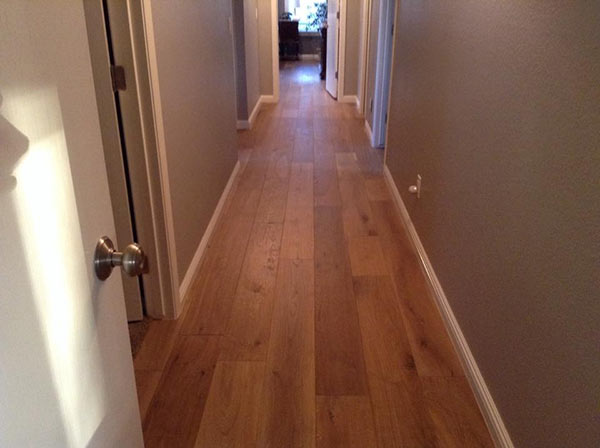 Simply beautiful! Alta Vista testimonial with photos of Malibu installed in a hallway.