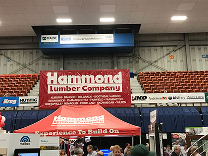 Hammond Lumber at trade show in augusta maine featuring Hallmark Floors