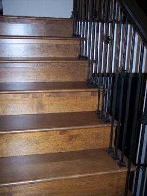 Silverado Mink Stairs top landing installation by Ron's Hardwood