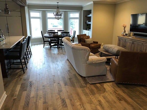Cassia Maple wood floors installed in a great room in Omaha, NE. The remodel was completed by G. Lee Homes. The wood floors were installed by Gautsche and Sons LLC.