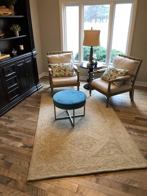 Cassia Maple, organic wood flooring, installed in a living room in a home in Omaha, NE. Organic wood floors by Hallmark Floors Inc.