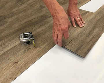 12mil vinyl Installation Demonstration by Hallmark Floors. Twelve Mil and Twenty Mil waterproof flooring is a glue down 12mil and 20mil vinyl floor.