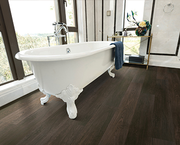 Margrave, Teak, from the Courtier commercial flooring collection installed in a bathroom.