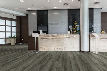 20 Mil waterproof commercial flooring from the 20 Mil vinyl collection by Hallmark Floors. Glue down waterproof vinyl flooring. Photo is of Oceanside 20mil commercial vinyl.