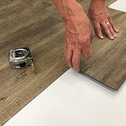 12mil and 20mil waterproof vinyl Installation demonstration by Hallmark Floors. Twelve Mil and Twenty Mil waterproof flooring is a glue down 12mil and 20mil vinyl floor.