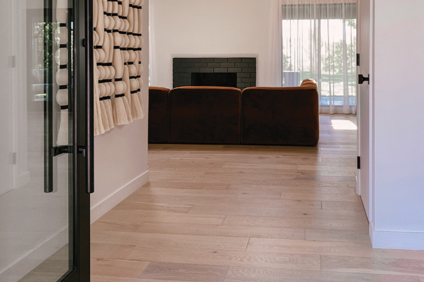 Modern Farmhouse Renovation with beautiful iron glass interior sliding doors and Alta Vista hardwood flooring!